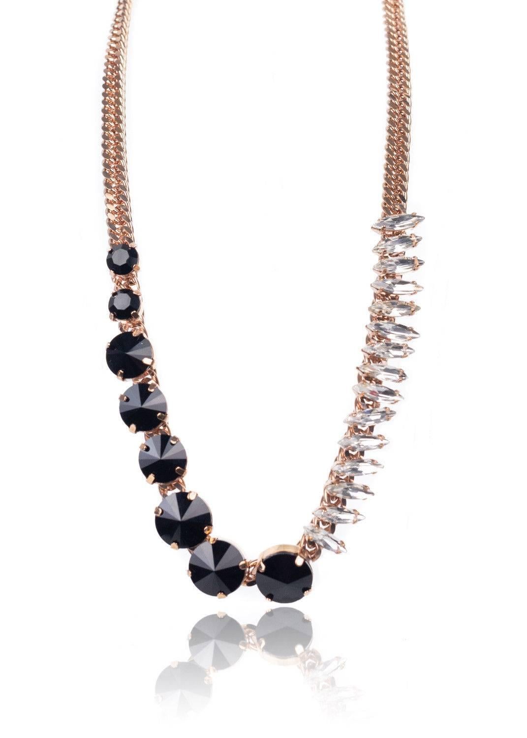 Get your Roberto Cavalli Necklace for an elegant finish. This necklace features a roped gold chain, chiseled black and coned stones, and lobster clasp closure. You can pair this necklace with a deep v neck dress and go.

9.5 inch Length
Chiseled