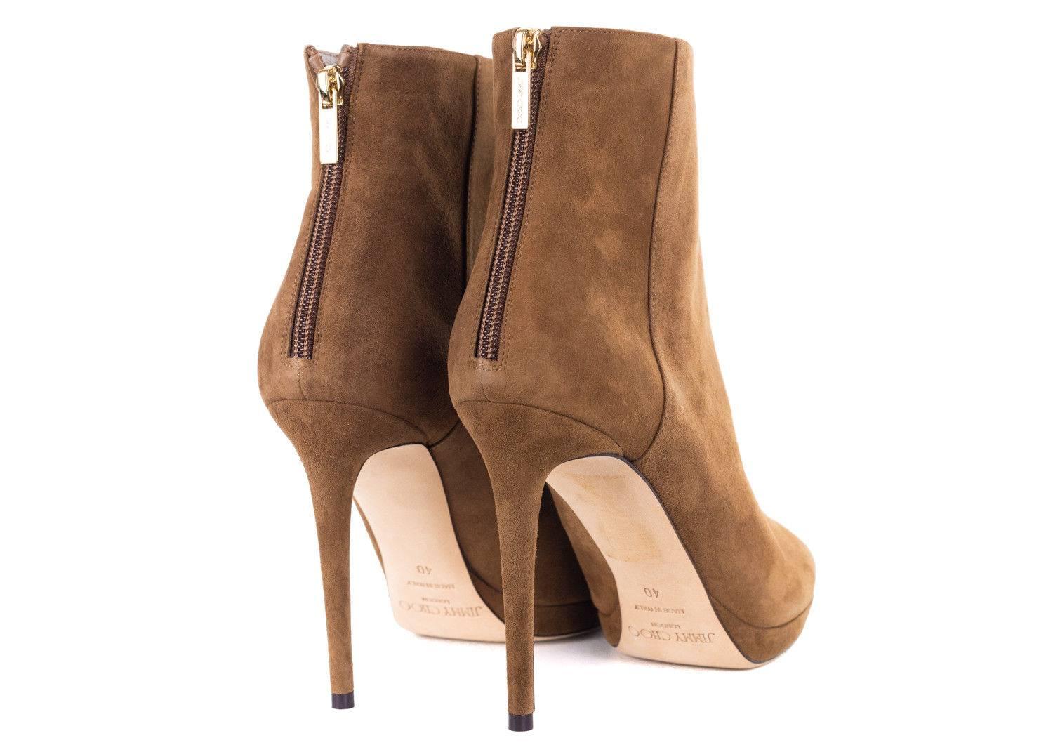 Jimmy Choos Harvey 100 ankle boots are made in Italy from supple suede for a look that is as timeless as it is alluring. The slender heel and uninterrupted silhouette offer clean cut appeal while the suede brown hue keeps the look classic and sharp.