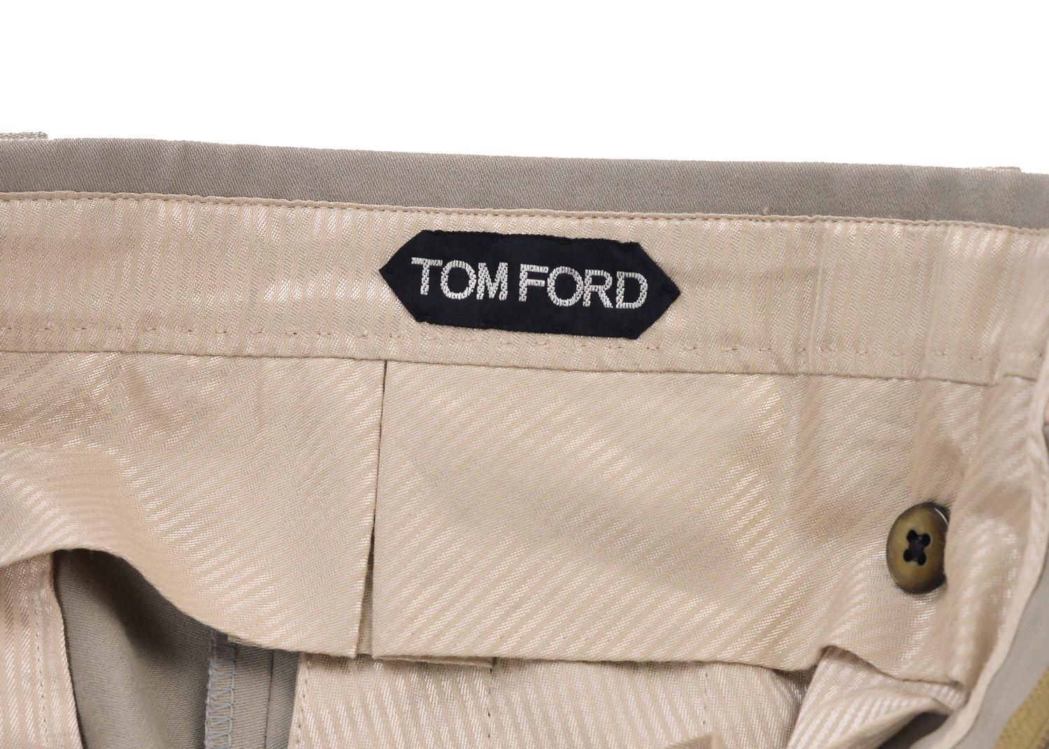 Tom Ford's pleated front trousers will provide subtle sophistication to your ensemble. These pants feature crisp pleated front lines, sheen striped lining, and concealed hem cuffs. You can pair these pants with a crisp white top for the ultimate