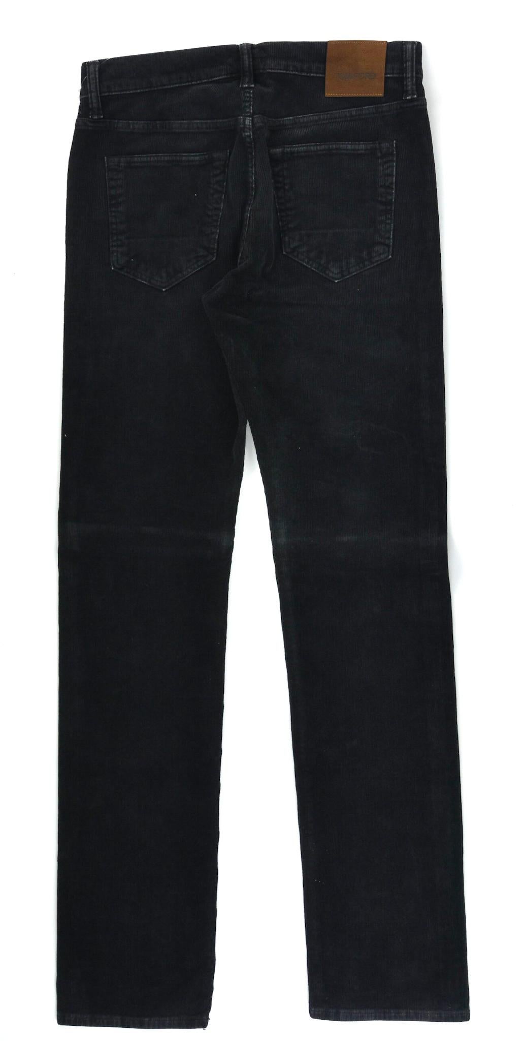 Display your effortless refinement with your Tom Ford straight fit pants. These pants feature dark grey colored corduroy texture, selvedge denim construction, and modern straight leg silhouette. You can pair these trousers with a slim fit t shirt