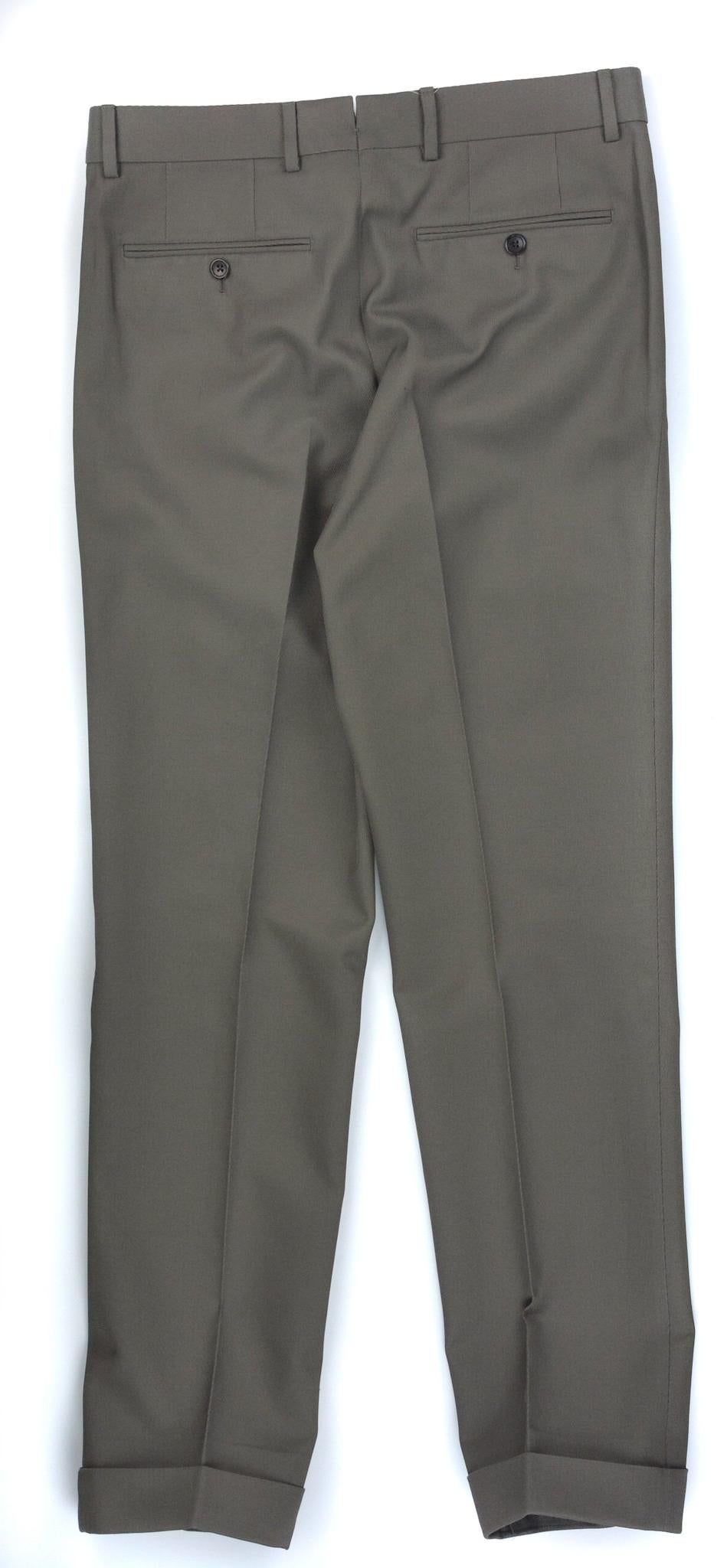 Tom Ford's pleated front trousers will provide subtle sophistication to your ensemble. These pants feature crisp pleated front lines, concealed pockets, and concealed hem cuffs. You can pair these pants with a crisp white top for the ultimate