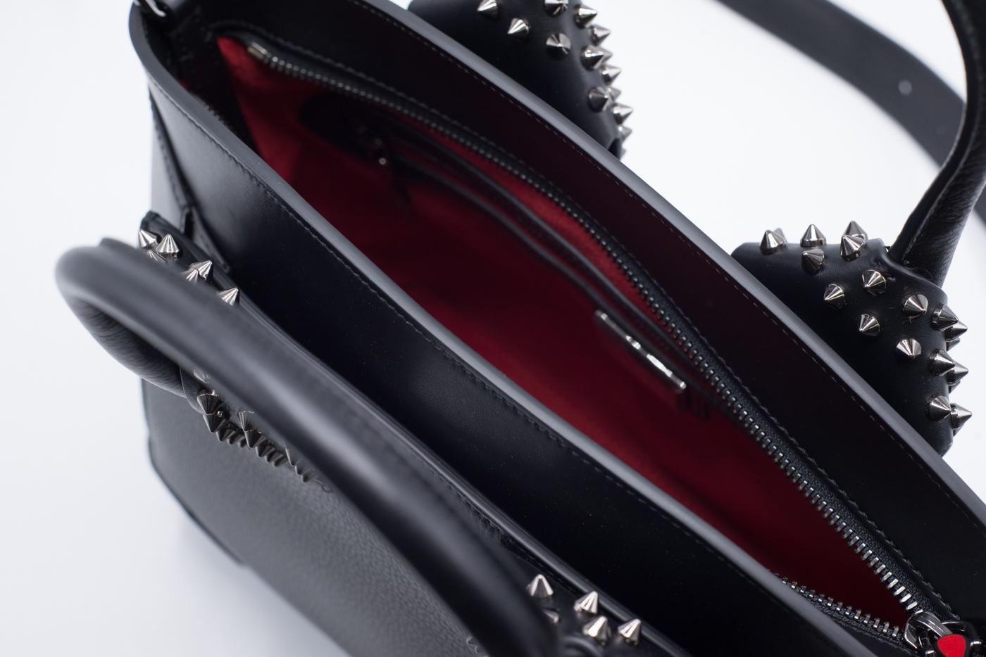 Christian Louboutin’s Eloise bag is crafted in Italy from grained calf leather in a rich Black hue – complemented beautifully by the signature gold-tone spikes. This structured style has plenty of space for your wallet, smartphone, and make-up