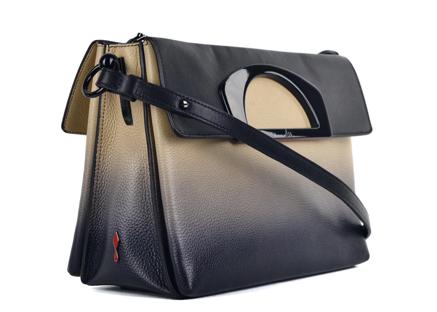 Black and creme ombré grained leather Christian Louboutin Passage bag with coated black hardware, dual resin flat top handles, optional flat shoulder strap, tonal stitching throughout, three interior compartments; one with zip closure, red
