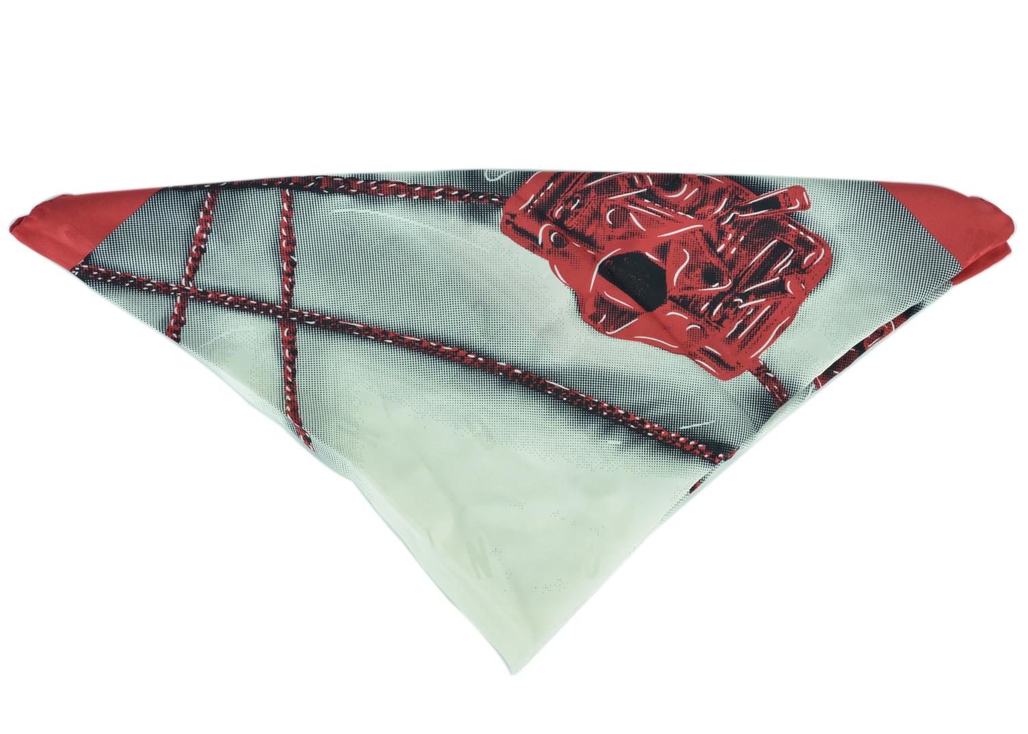 Moschino red printed scarf. This scarf is made from 100% silk for an ultra smooth and luxurious luster textile. The scarf features prints of chains and moschino moto jacket bags for an allover Moschino look. Pair with a white blouse for this scarf