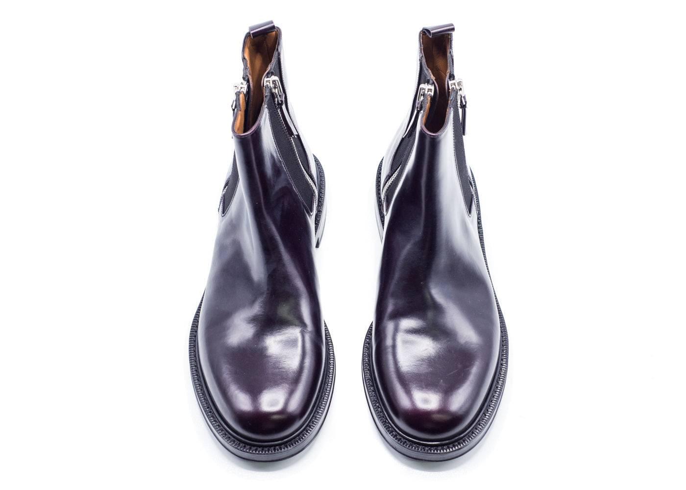 Classic ankle boot silhouette in a dark purple tone from fashion house Givenchy. Perfect for any outfit and any day yo up your fashion game and wardrobe. 

Composition: 100% Calfskin Leather
Leather Lining
Zip Fastening
Rounded Toe Line
Dark Purple