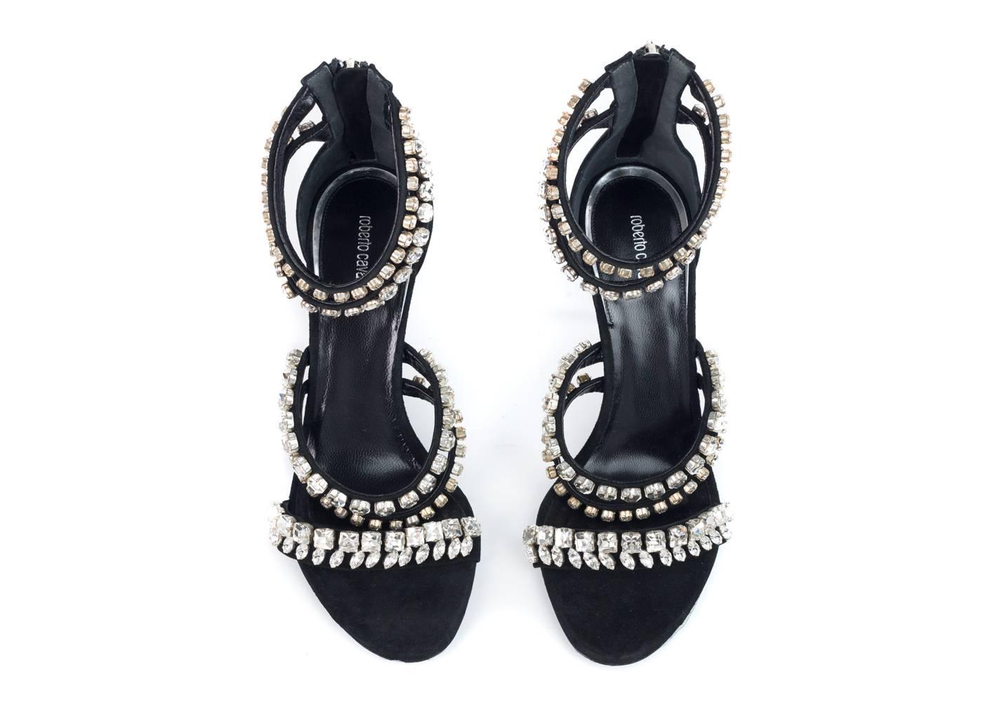 
Brand New Roberto Cavalli Heels
 Original Box & Dust bag Included
Retails in Stores and Online for $985
Size IT36 / US6 Fits True to Size

Roberto Cavalli black suede sandals are embellished with beautiful crystals. Sassy and unique, these