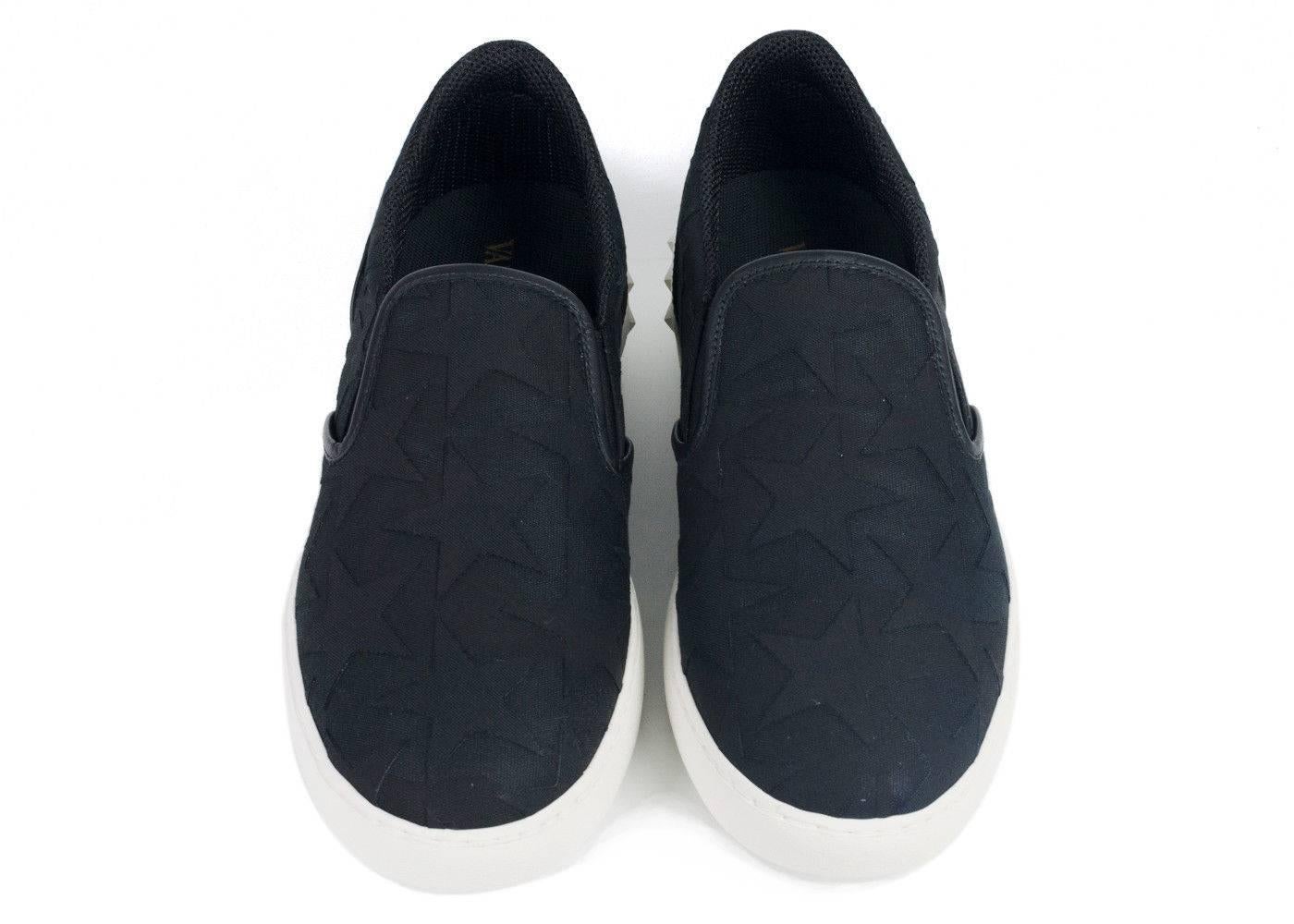Brand New Valentino Rockstud Slip On Sneakers
Original Tags and Dust Bag Included
Retails in Stores & Online for $845
Men's Size EU 39/US 6 Fits true to size


The Valentino Rockstud sneakers are the ideal slip-ons. These canvas sneakers feature