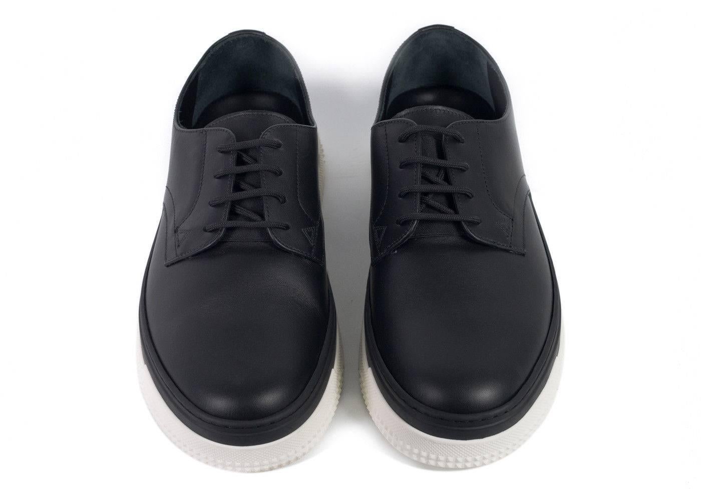 Brand New Valentino Sneakers
Original Box & Dust Bag Included
Retails in Stores & Online for $895
Size IT43.5 / US10.5 Fits True to Size

These black and white Valentino leather shoes are an elegant pair from the luxury label's feted Spring/Summer