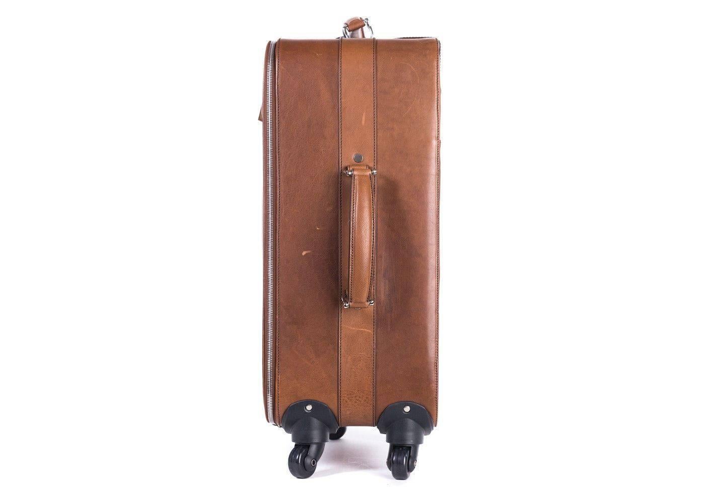 Brand New Brunello Cucinelli Trolley Bag
Dust Bag Included
Retails in Stores & Online for $5195


A refined choice for anyone, Brunello Cucinelli 's trolley case has been crafted in Italy from brown calfskin leather. It has a capacious interior with
