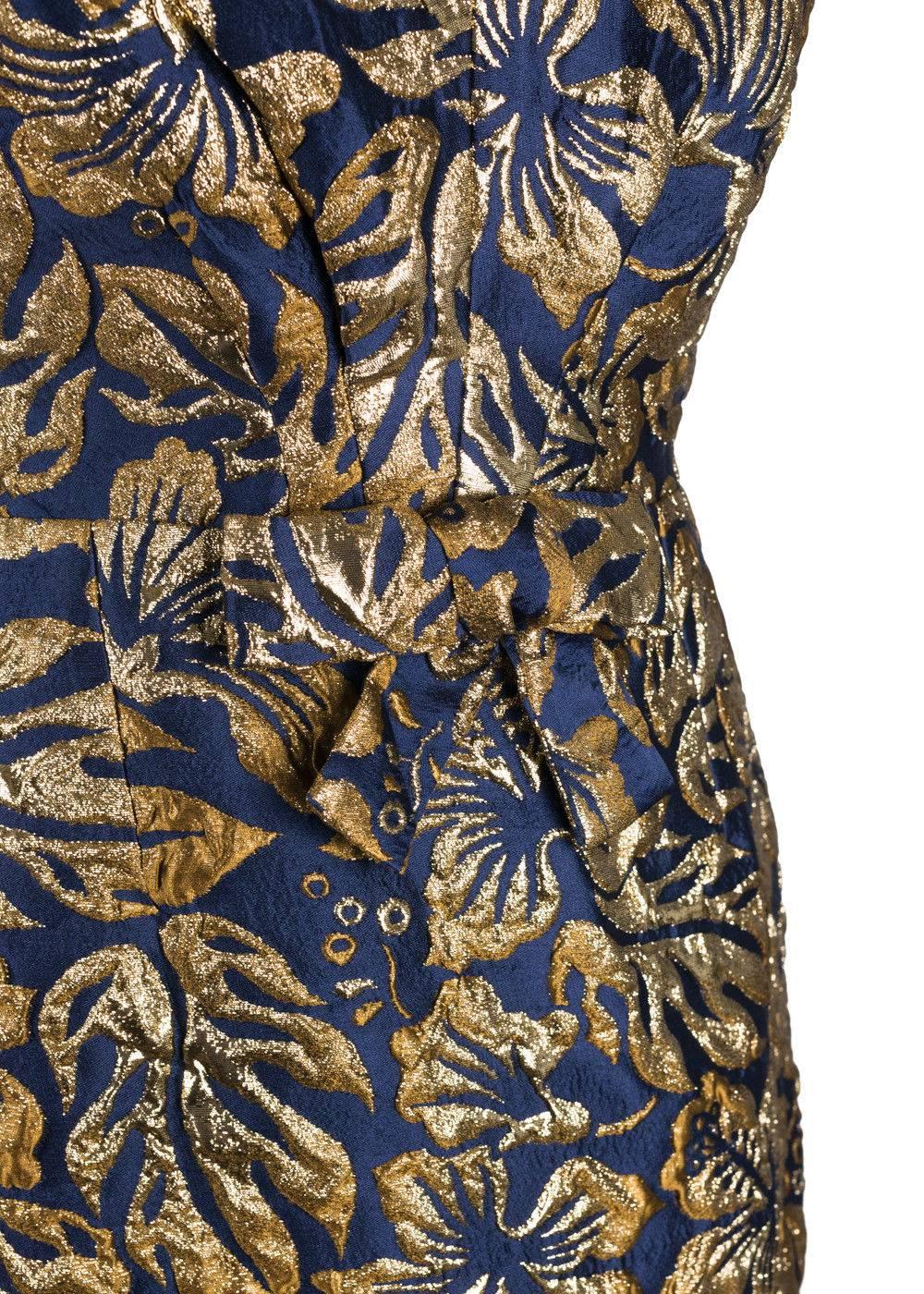 Prada Womens Sleeveless Dress
Original Tags
Retails In-Store & Online for $2630
Size EU 44 / US 10


This midi dress is uniquely crafted from the Italian fashion house PRADA! Crafted from navy fabric with a gold hibiscus flower jacquard pattern