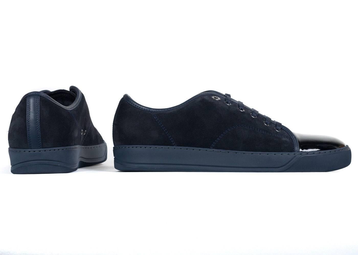 Brand New In Original Box
Retails Online and In-stores for 595
Men's Size UK10 /US11


The Dark Blue Lanvin Lace Up is the perfect fall/winter essential. These low top sneakers are perfect for semi-casual events and or night events. The suede body