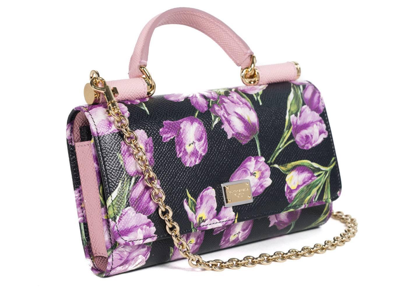 Brand New Dolce&Gabbana Shoulder Bag
Original Tags & Dust Bag Included
Retails in Stores & Online for $1171

Dolce & Gabbana's Von wallet shoulder bag in a purple floral printed pattern and pink top handles. This black floral bag is