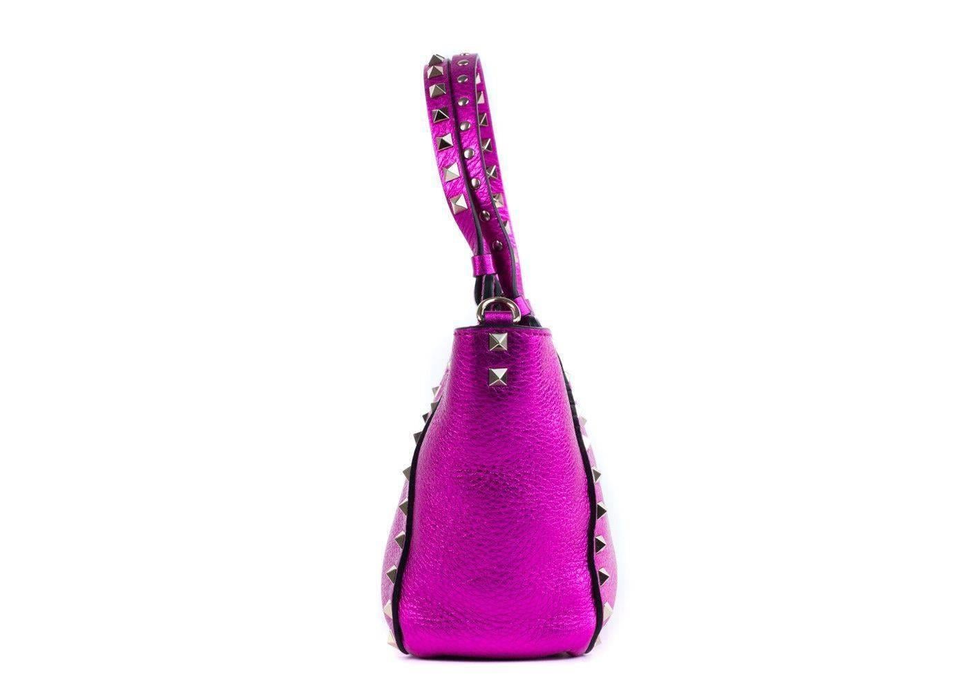 Brand New Valentino Tote Bag
Original Tags & Dust Bag Included
Retails in Stores & Online for $2034
Considered as a size Mini

Gorgeous hot pink Valentino tote in their signature rockstud silhouette. Perfect for this summer season to shine