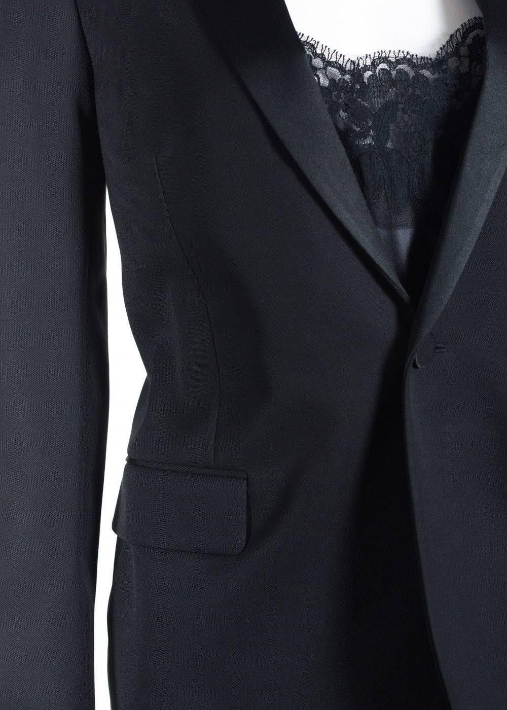 Brand New With Tags
Retails Online and In-stores for $3490
Size EUR 36 / US 4 Fits True to Size


Top your ensemble off with the unforgettable Saint Laurent Tuxedo Jacket. This amazingly tailored jacket is made off rich wool crepe and silk for the