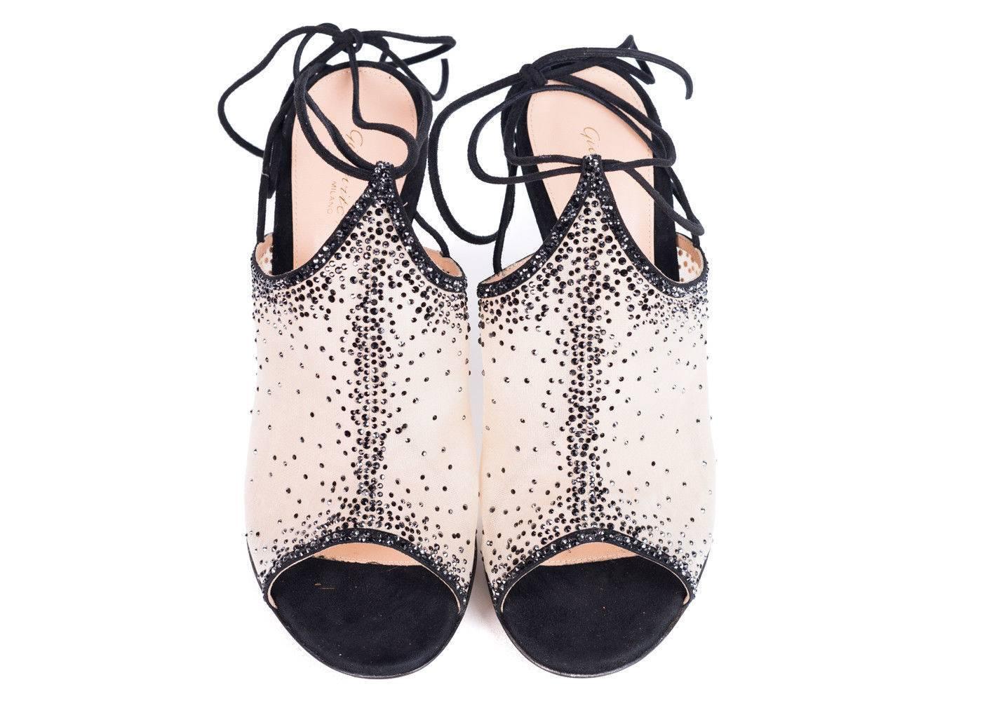 Brand New Gianvito Rossi Etoile Crystal Embellished Ankle-Wrap Mules
Retails In-Store & Online for $1995
New Without Box
Size IT 37 / US 7

Lace up your Etoile Crystal Embellished Ankle-Wrap Mules and embrace the night. These embellished open toe