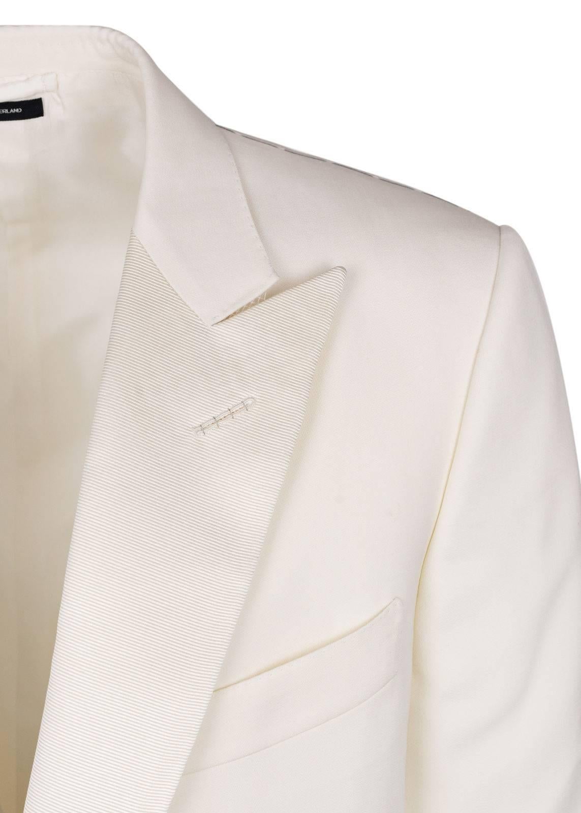 Tom Ford designed this outstanding O'Connor Jacket for that special occasion.This cocktail jacket features a textured peak lapel, single button closure, and a rich blend of mohair. You can pair this cocktail jacket with dark streamlined slacks and