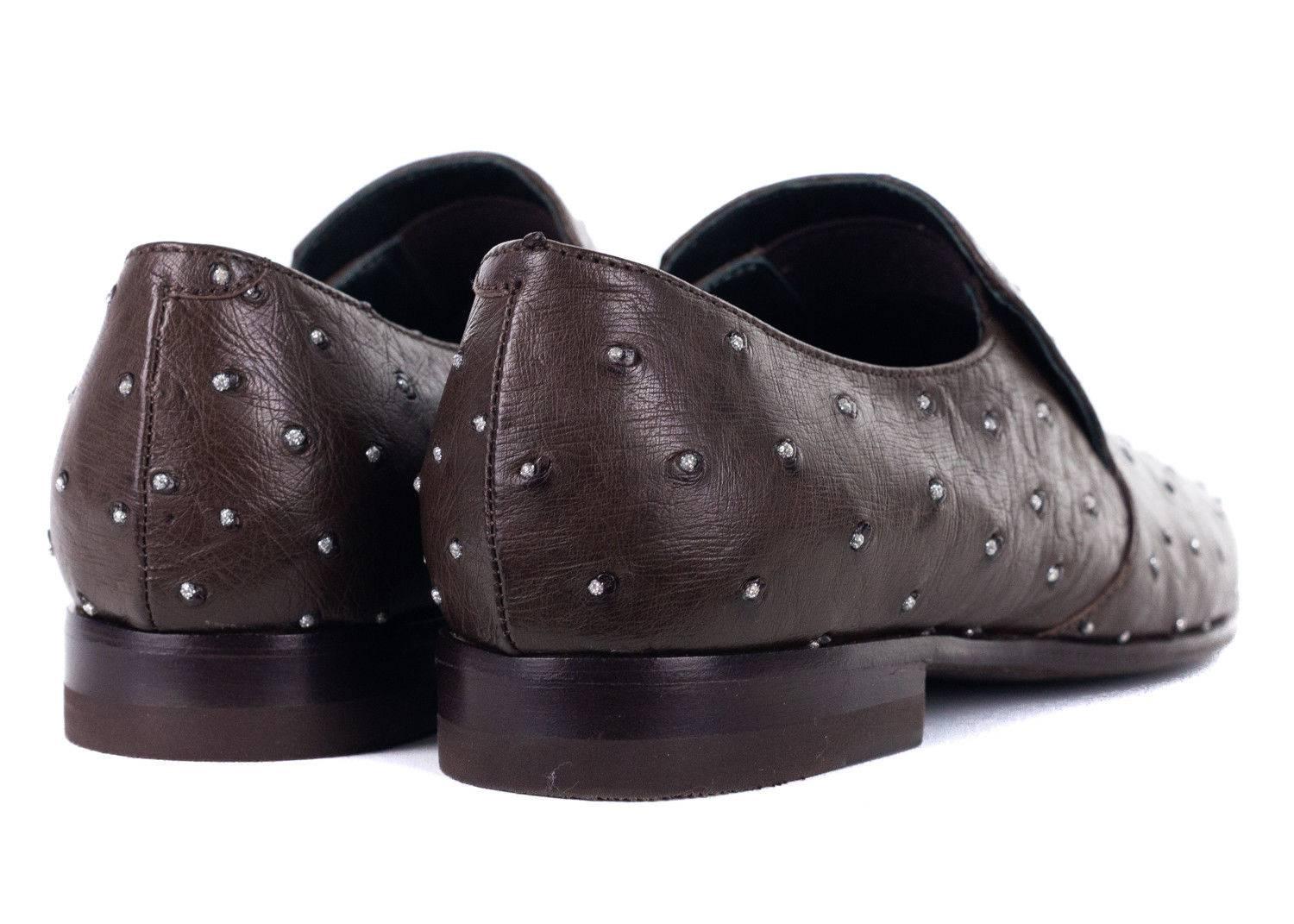 Brunello Cucinelli's Stone Studded Slip ons are perfect on hand pair for that special occasion. These shoes feature a uniform all over stone studded theme, crinkled leather, and easy slip on silhouette. You can pair this shoe with slacks, or cream