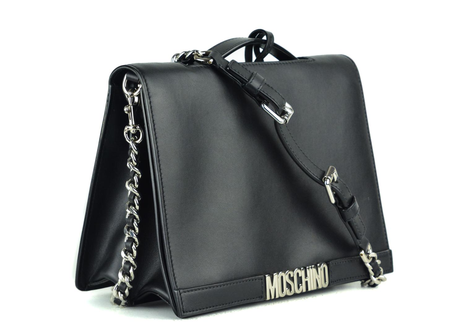 Treat yourself to Moschino's Luxury Shoulder Bag with this all black beauty. This bag features silver flap front logo lettering, interior double compartment for storage, and detachable silver chain strap. You can pair this bag with the perfect all