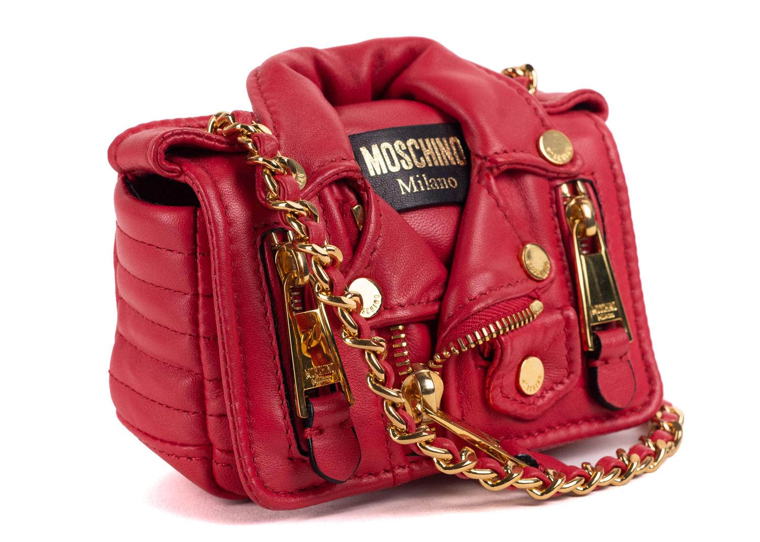 Moschino creative director Jeremy Scott reinvents the moto jacket a must in everyones wardrobe with this street chic leather bag. Perfect statemented bag for all seasons and throughout the years.

Moschino lambskin leather shoulder bag
Unique moto