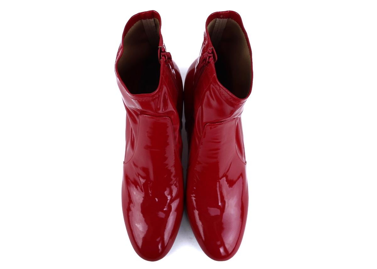Valentino red patent leather ankle boots. These boots feature a bold red color on a classic ankle boot silhouette for a pop of color this summer season. Pair it with regular ripped denim and a chic blouse for a statemented look.



Patent