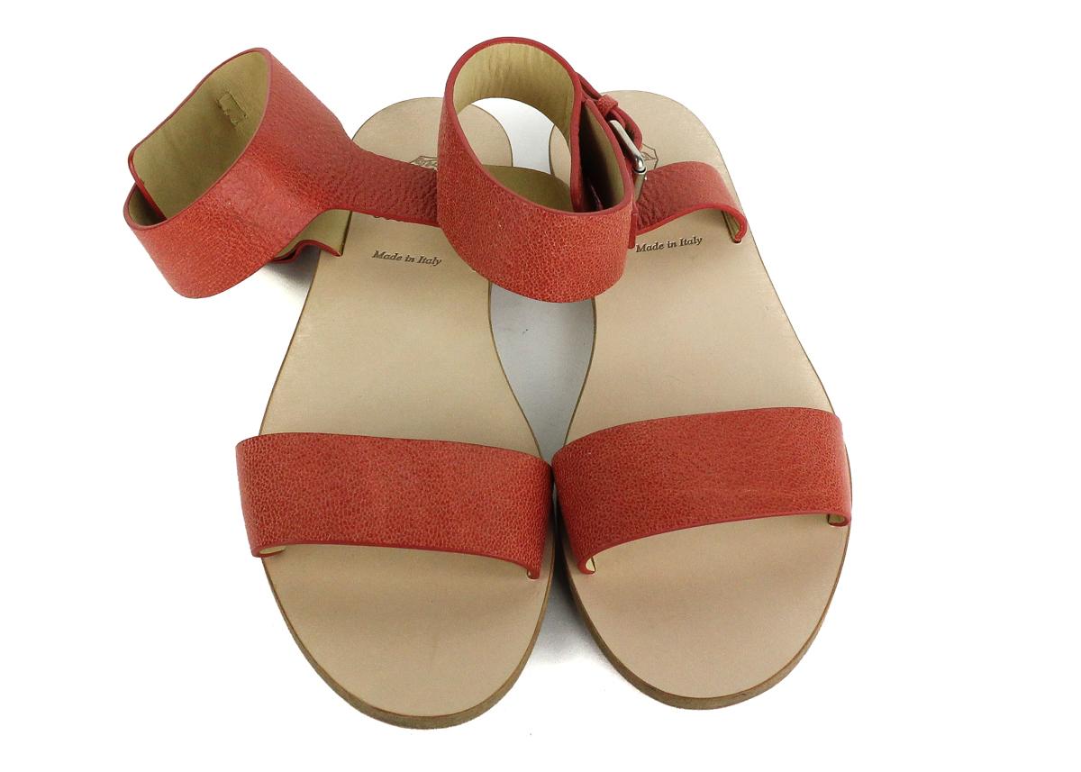Brunello Cucinelli orange leather flat sandals. These sandals feature a orange color on a classic pair of flat sandals. Perfect for the summer pair it with a summer dress or shorts for a chic everyday look.

Leather
Ankle Strap with Buckle