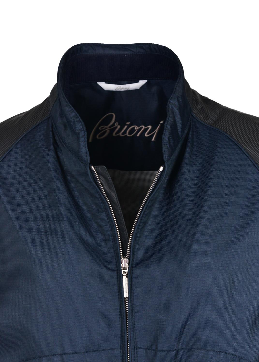 Brioni's reinvents your typical bomber jacket with this latest edition. This bomber features a black mesh inspired print paneling, silk infusion, and smoothly updated micro houndstooth interior lining. You can zip out of your bomber with confidence