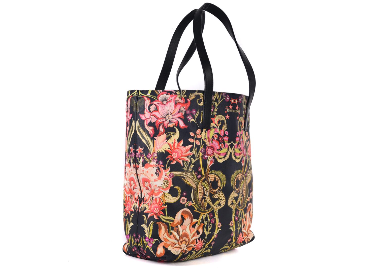 Get in touch with your inner nature with your Roberto Cavalli Shopper Tote. This tote bag features a rich black base, pink and yellow infused floral illustrations, and black flat handles. You can store your daily essentials in this vibrant beauty