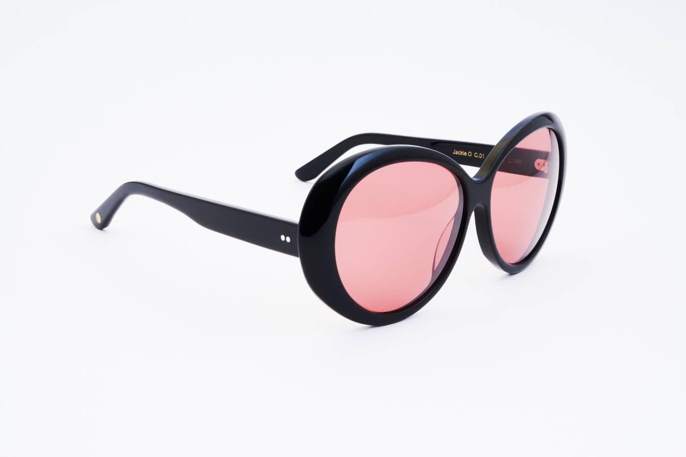 Jackie O. Spectacle is a tribute to Jacqueline Kennedy Onassis. Elegant, never dull and daringly confident. An evergreen piece you merely look for the next generation. Beautifully handcrafted in Italy.