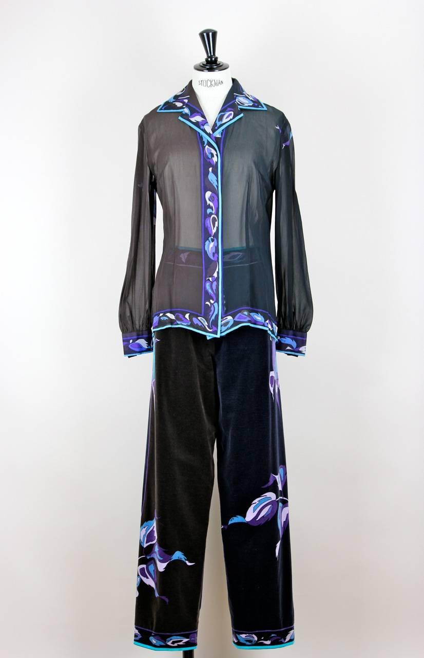 This stunning 1971 silk chiffon blouse and cotton velvet palazzo trousers hostess ensemble features the “Rosa“ print, one of Emilio Pucci's fabulous signature floral prints, in turquoise, purple, shades of blue and white.

The sheer silk chiffon