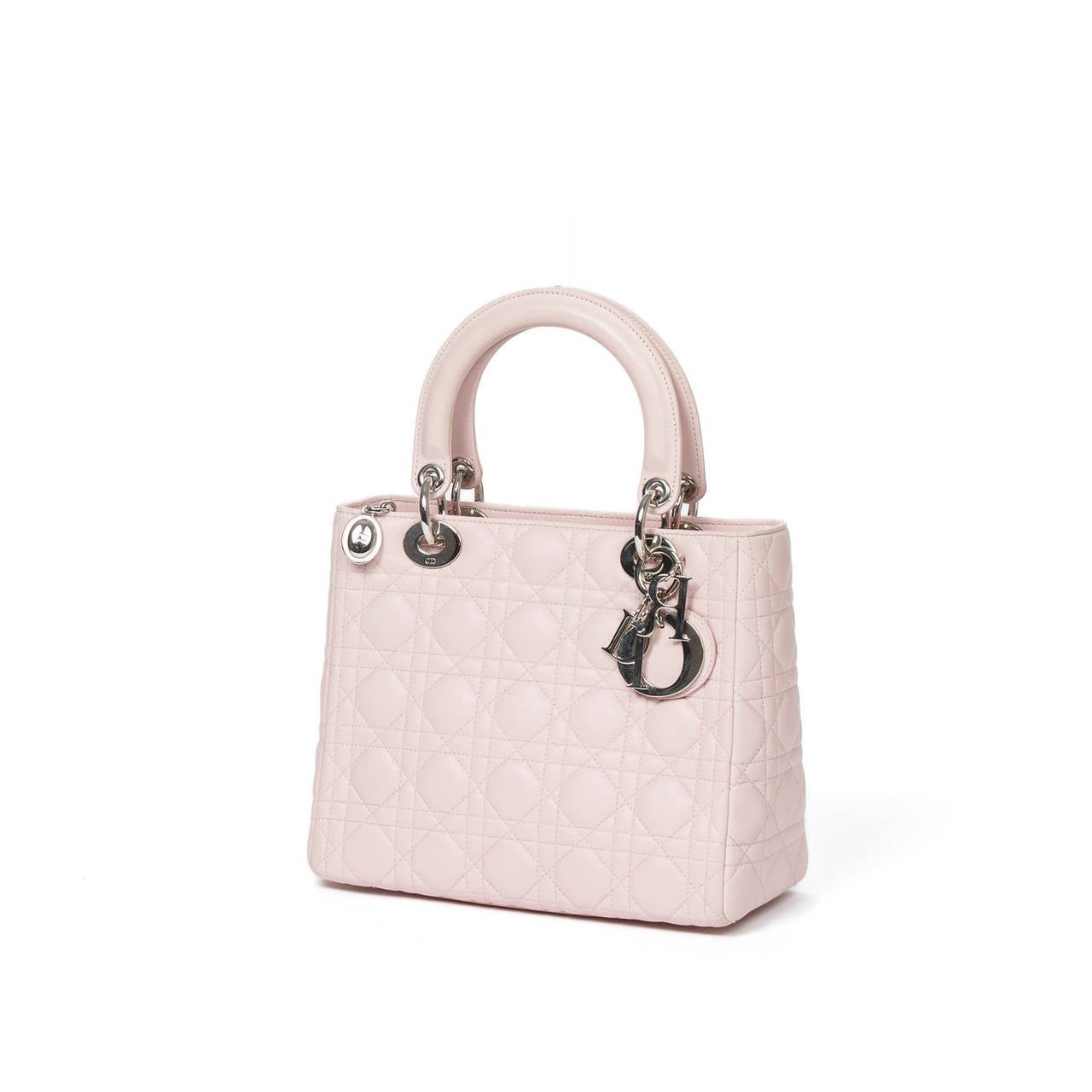 Lady MM in beautiful Dragee Pink Cannage leather with shoulder strap, silver tone hardware. Light pink pattern fabric lining with zip pocket. Comes with authenticity card and dust bag.