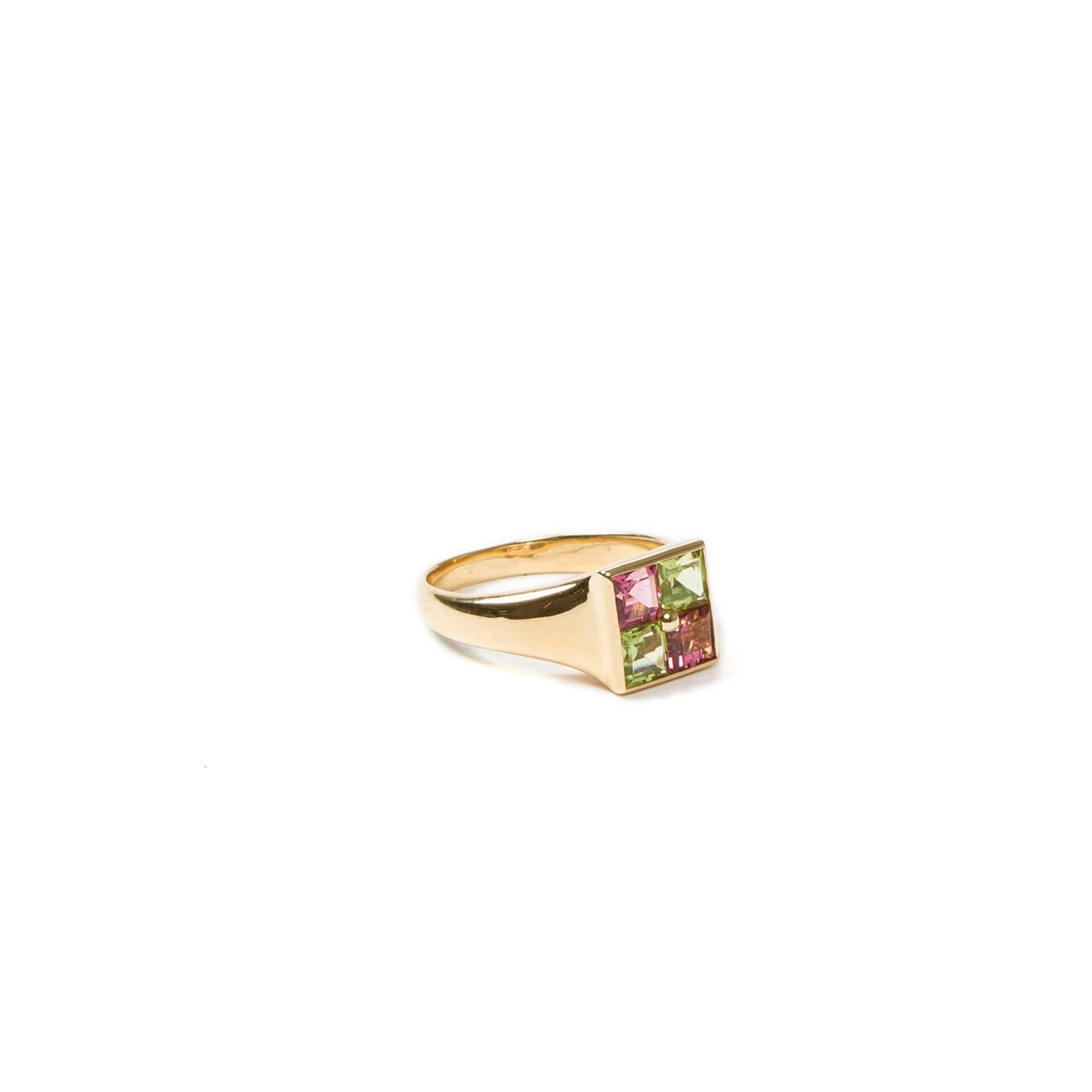 Square ring in 750 yellow gold with 2 princess cut peridots and 2 princess cut pink tourmalines. Each stone mesures about 4mm. Hallmarks inside the ring 