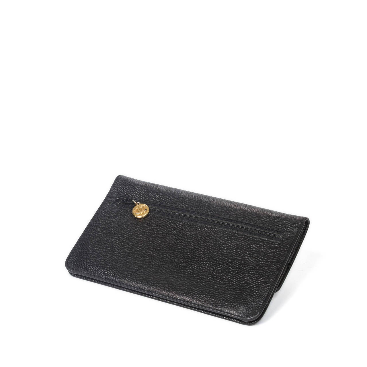 Chanel Pouch wallet in black grained leather. Gold tone hardware. Authenticity card included. Date code : 3454723. Model of 1994 -1996. Slight scuffs on the leather. Excellent condition.