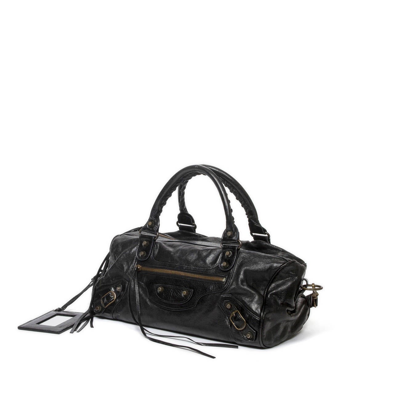 Balenciaga City Bag in black distressed leather with black leather handles (13cm) and strap (23cm) and brushed antique gold hardware. Mirror included.
Signs of wear on the leather, still in very good condition.