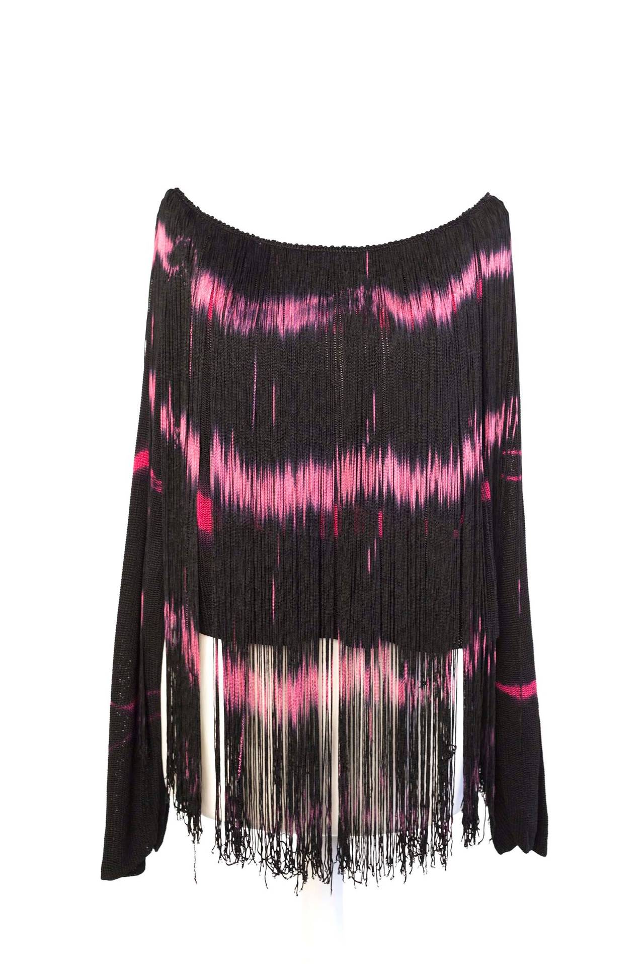 Jean Paul Gaultier vintage tye dye fringed top. Top has long fringe and is tye dyed in a fuschia color front and back, scooped neck and 3/4 sleeves.