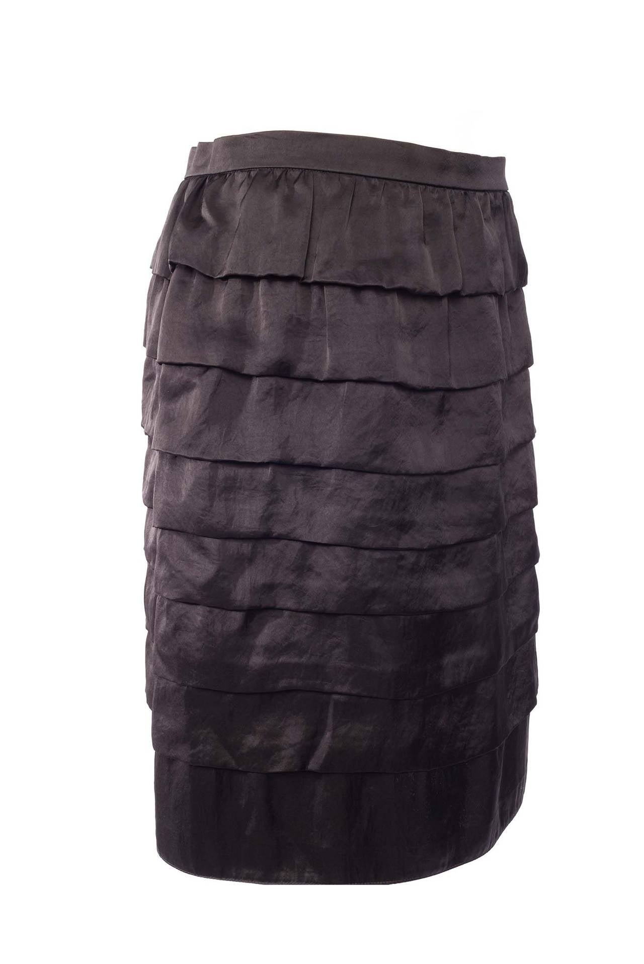 Lanvin black tired skirt from winter 2006. Skirt has 7 tiers, fully lined, waistband and side zipper.