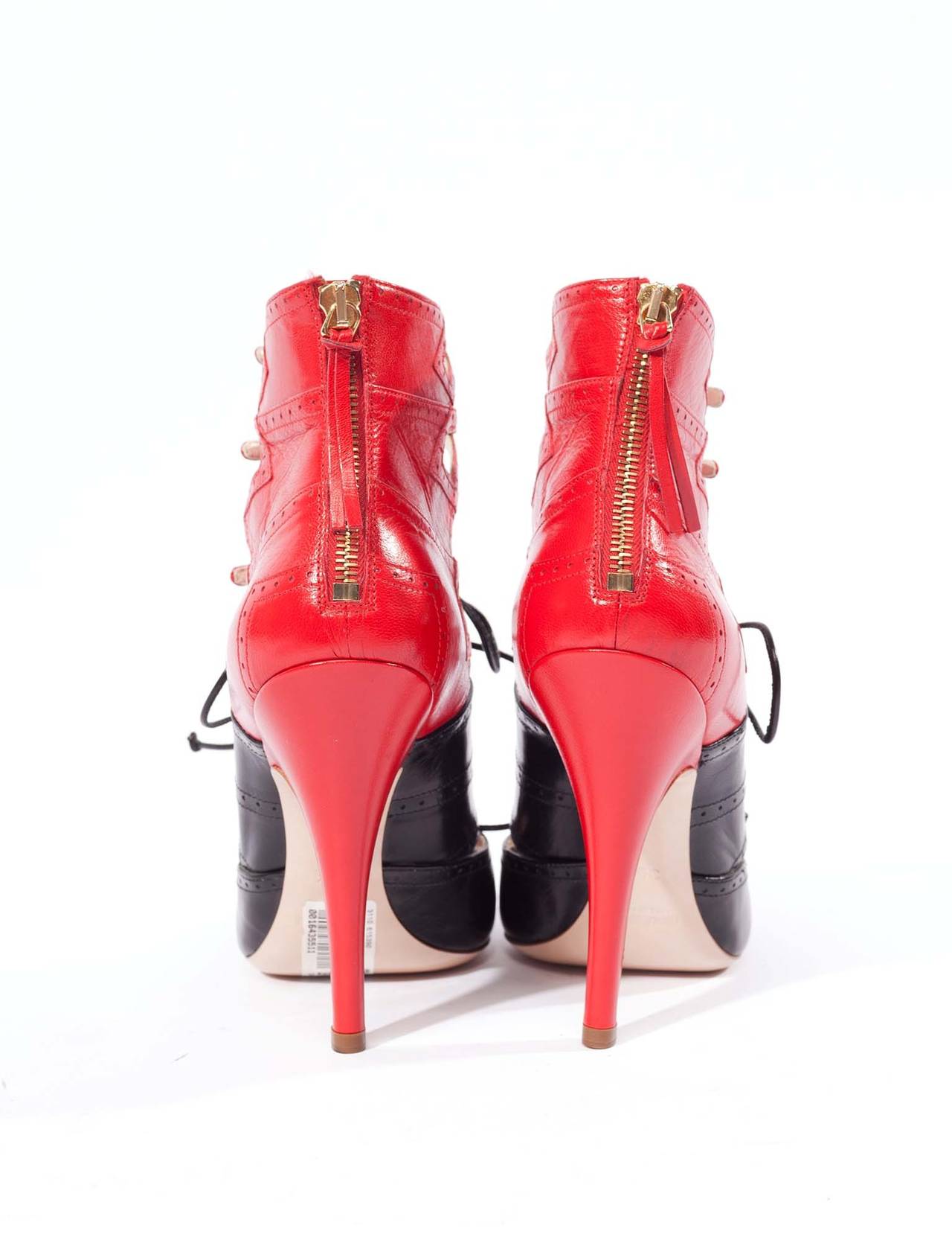 Miu Miu wingtip heels with strap details In New Condition In Berlin, DE
