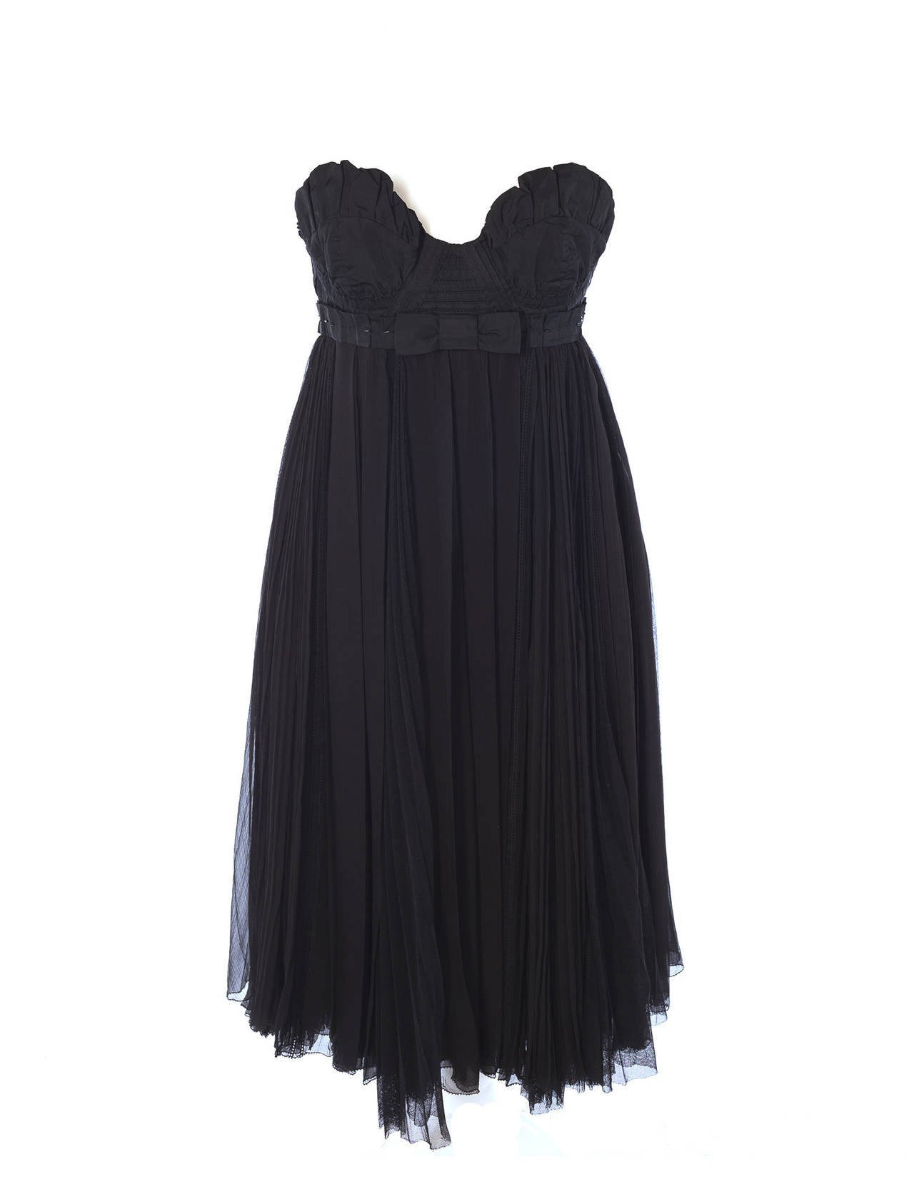 Louis Vuitton by Marc Jacobs Black Bustier dress with organza pleated skirt. Dress has several 1920's details, multi pleated skirt with lace detail inserts. bustier is strapless with black bugle bead work, black grosgrain ribbon details and is of