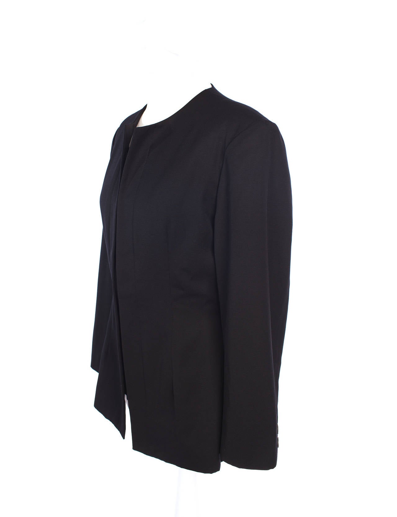 Yohji Yamamoto vintage 90's collarless black blazer. Blazer has double front placket, asymmetrical side button details, front and back darts, 6 buttons, fully lined.