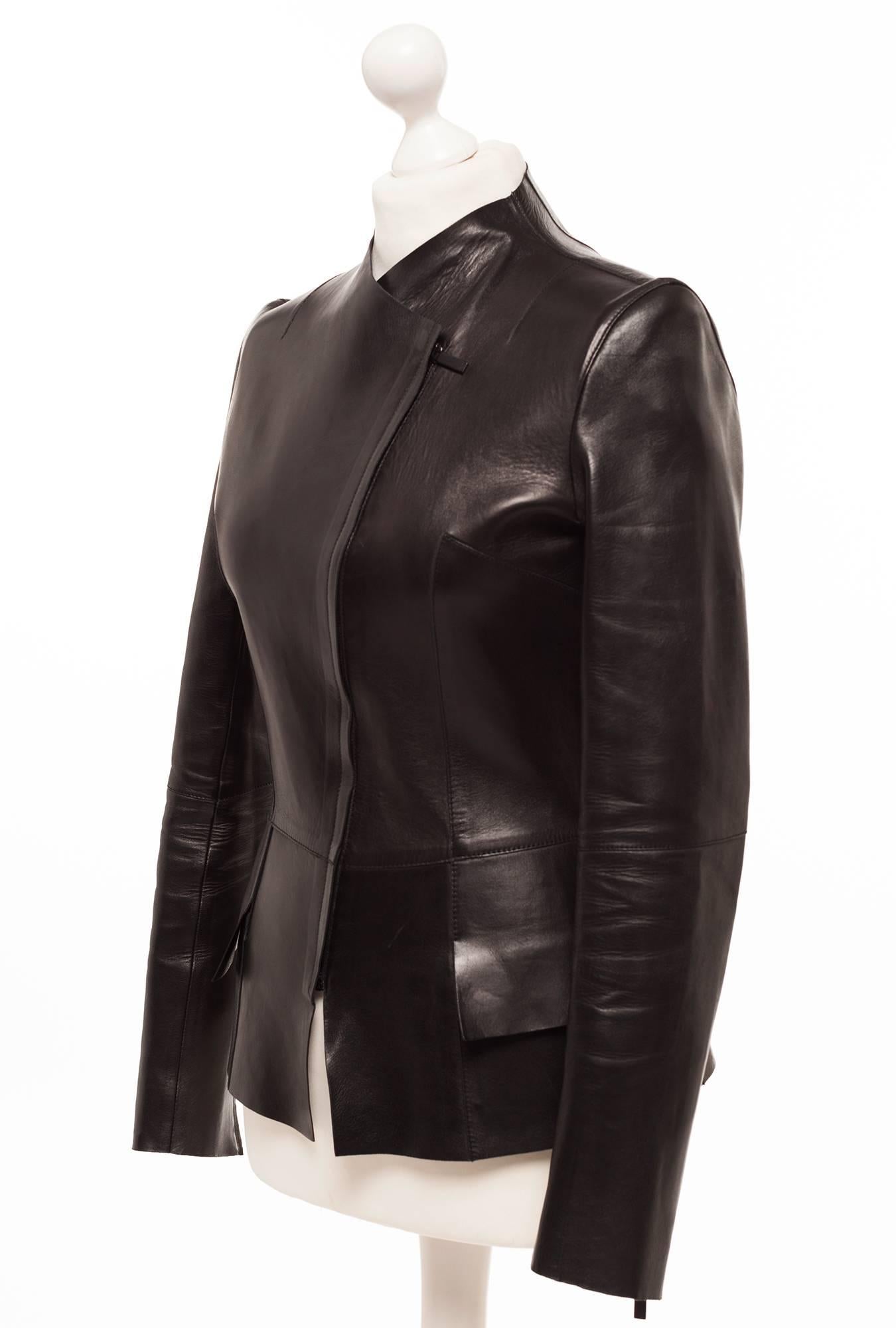 Gucci by Tom Ford Leather asymmetrical Blazer. Blazer or Jacket is exquisite in the cut and shape and all the details it offers to enhance the wearer into another feeling of sexiness. asymmetric front zipper, Slight shoulder puff detail, extensive