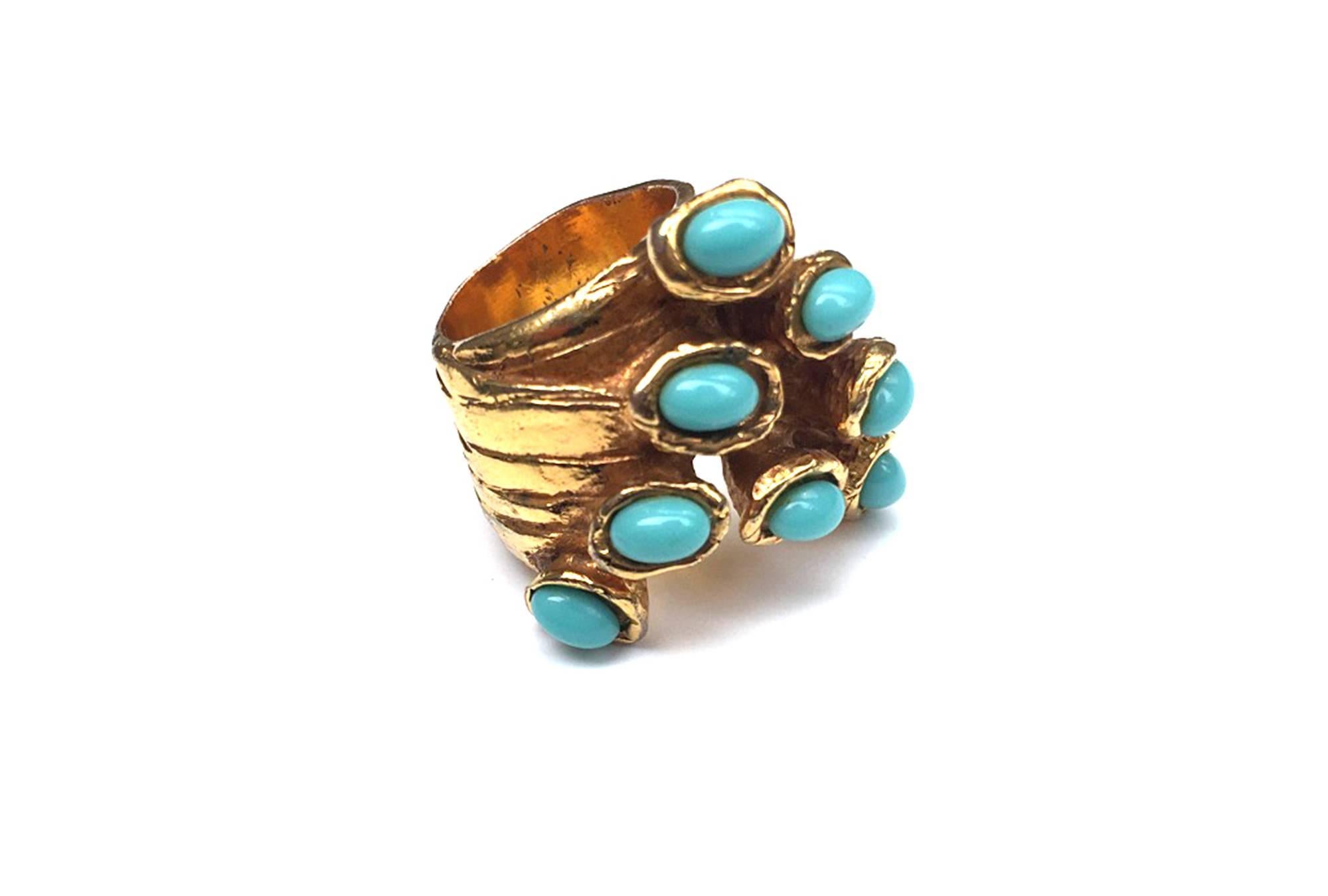 YSL Arty Oval Ring with turquoise Stone & Gold-Toned Finished Metal by Stefano Pilati for YSL. Pilati is trying to show the relevance of the heritage through a contemporary eye.