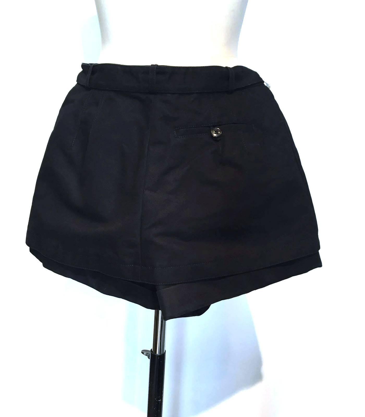 Mini Skort or shorts, this is a unique piece by Balenciaga, thick stiff cotton, extended skirt top overlay, waist band and lots of kool details makes this piece an instant sensation.