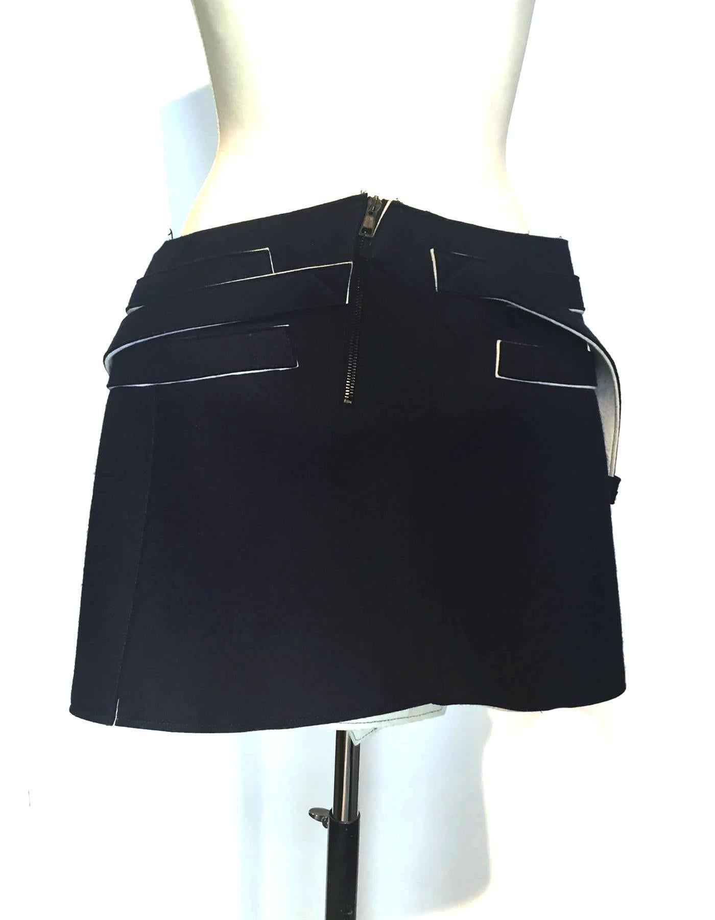 Skirt is cut just above knees, and has cool belt details, definitely a classic with a twist from Balenciaga.