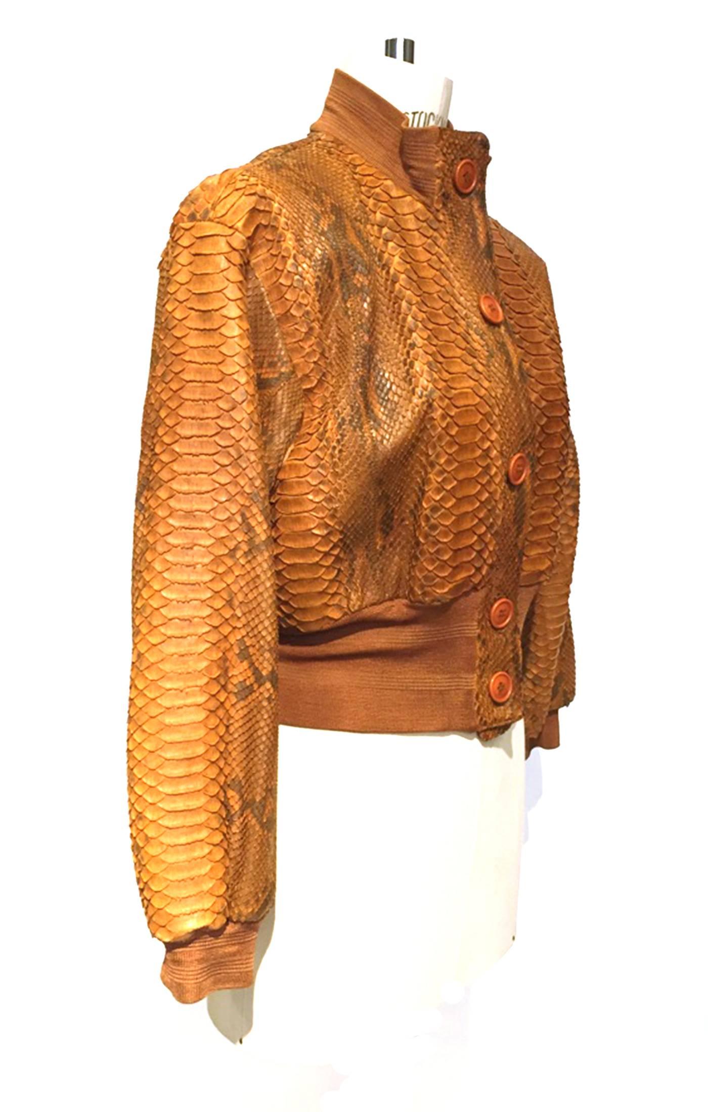Amazing Gianfranco Ferre vintage python bomber jacket from mid 1990s. Natural python snakeskin leather shell retaining original tan, beige. Bomber jacket style, shorter length, banded waist. Tan silk lining. 2 front pockets. 4 button front closure.