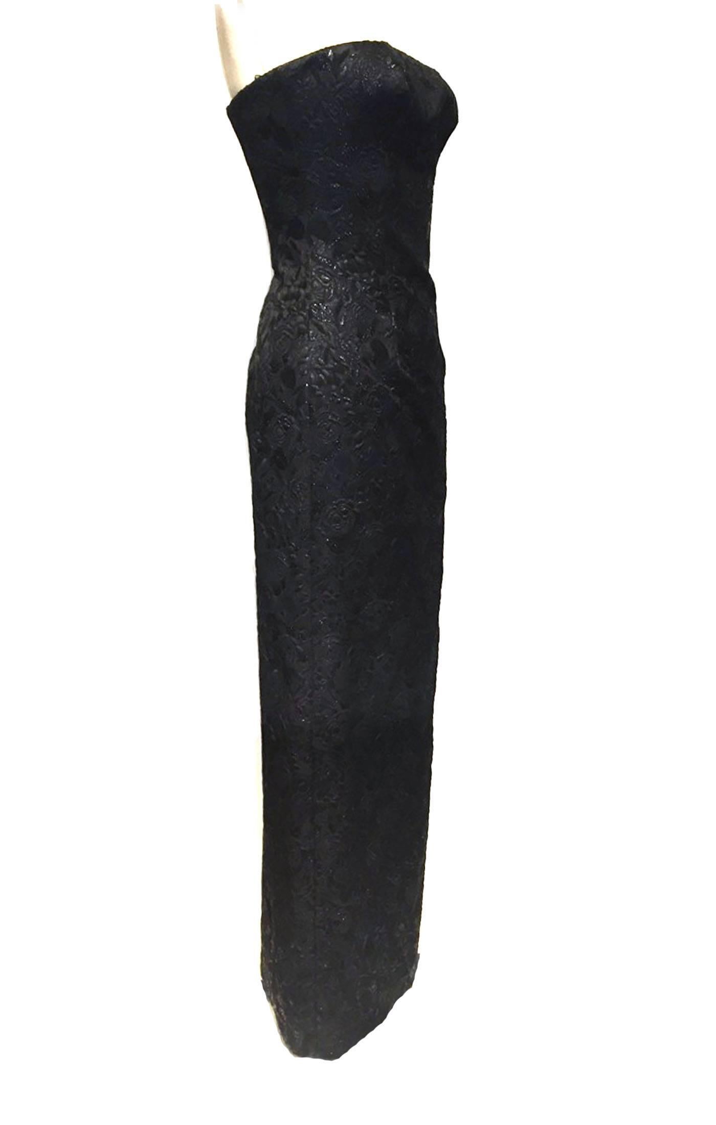 Dreamy sleeveless Prada embroidered blk ballgown. Prada's black dress is spun from soft wool blend, with abstract floral embroidery. Zipper in back. Excellent condition!