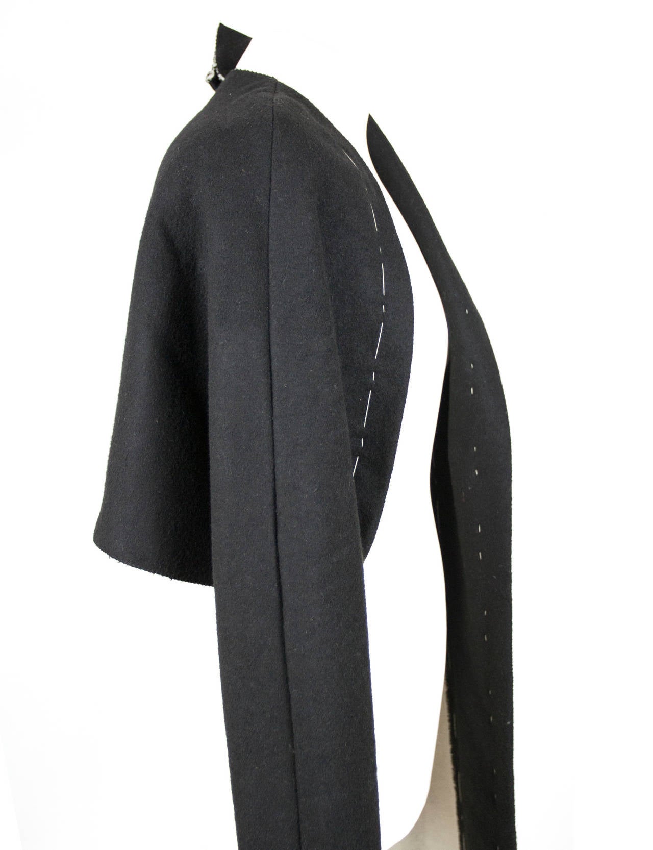 The semi couture boiled wool half coat is repurposed from an old military coat. Museum quality! One Size.