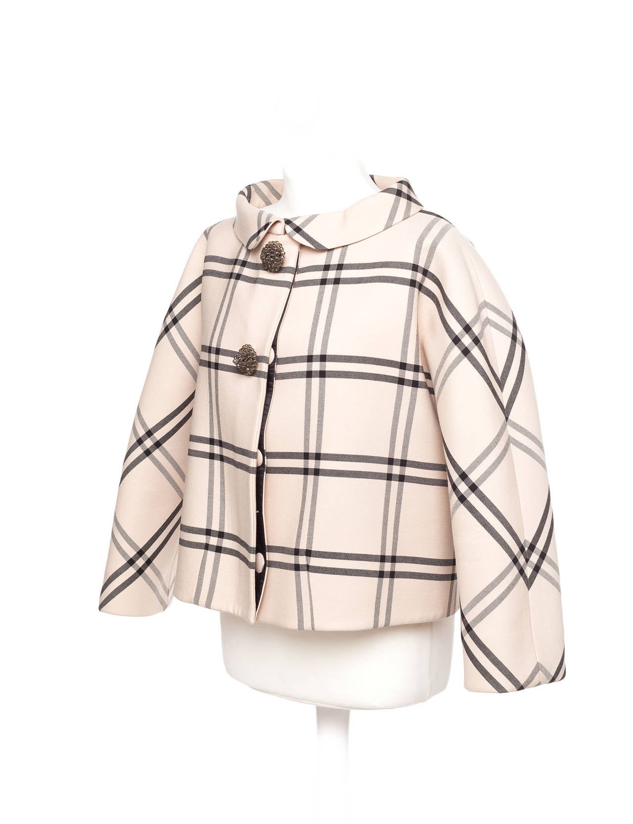 . Fall 2006 Molded plaid Jacket with an aline shape, back belt, and jeweled glass buttons. Jacket is iconic couture shape with incredible details and finishes and is a must have for any collector of Vintage Balenciaga. QUOTE 