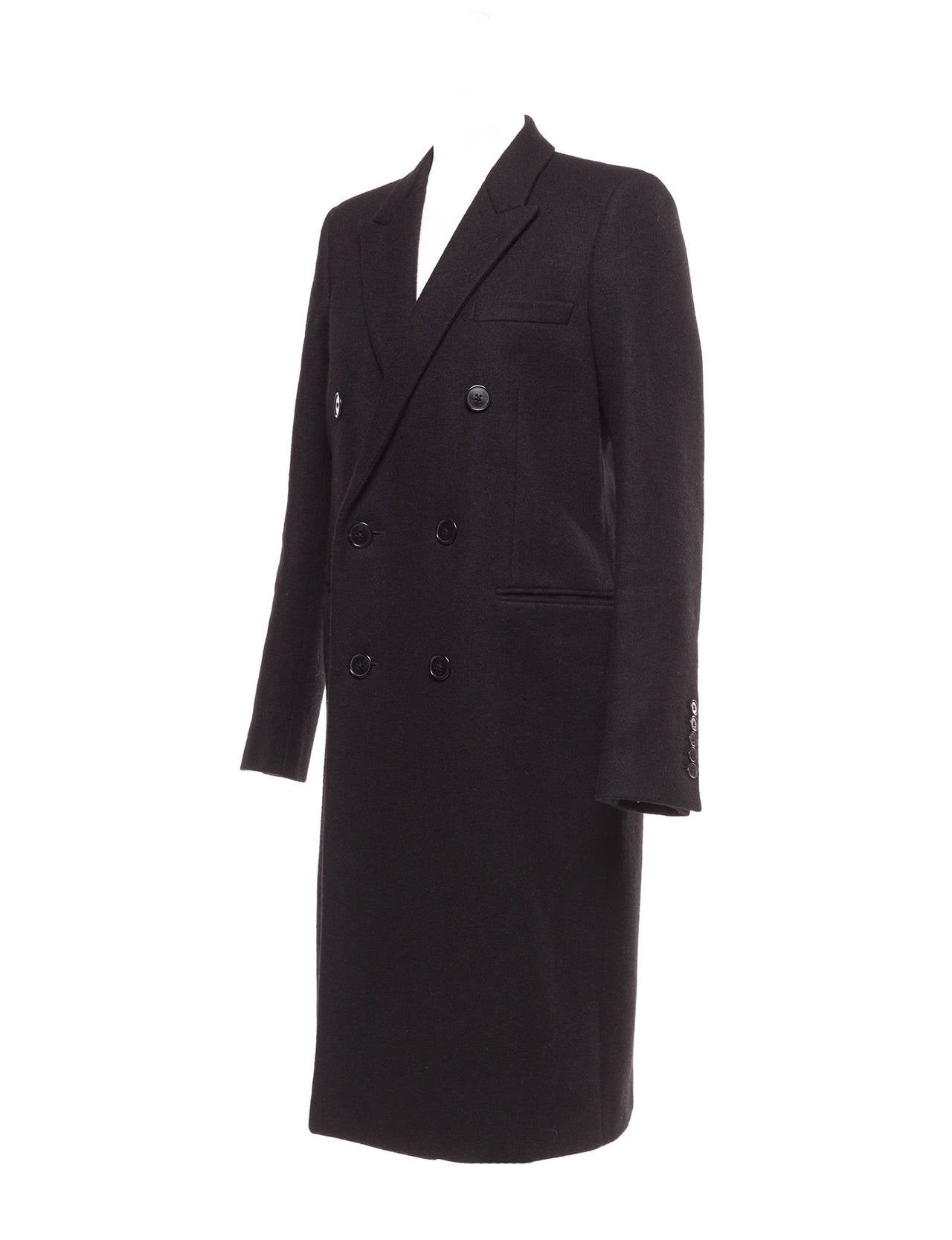 Coat has notched lapel collar detail and is cut with the slimane tailored precision that he is known for, Coat is 3/4 length and fully lined. Possibly from Fall 2013