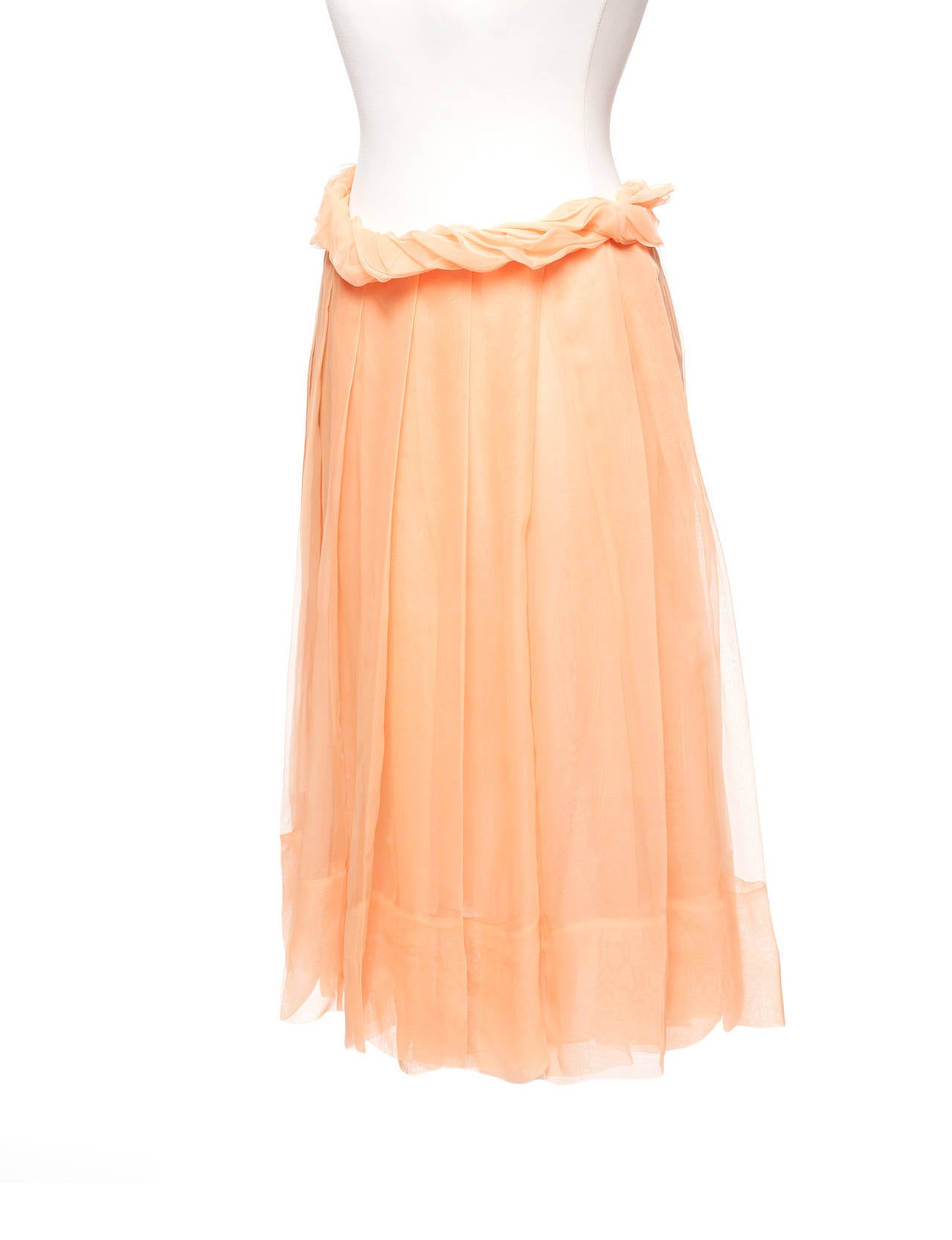 Skirt has petal shaped waist treatment, large inverted pleats, front and back and is sheer and elegant. This is a studio prototype. US 10, EU 38