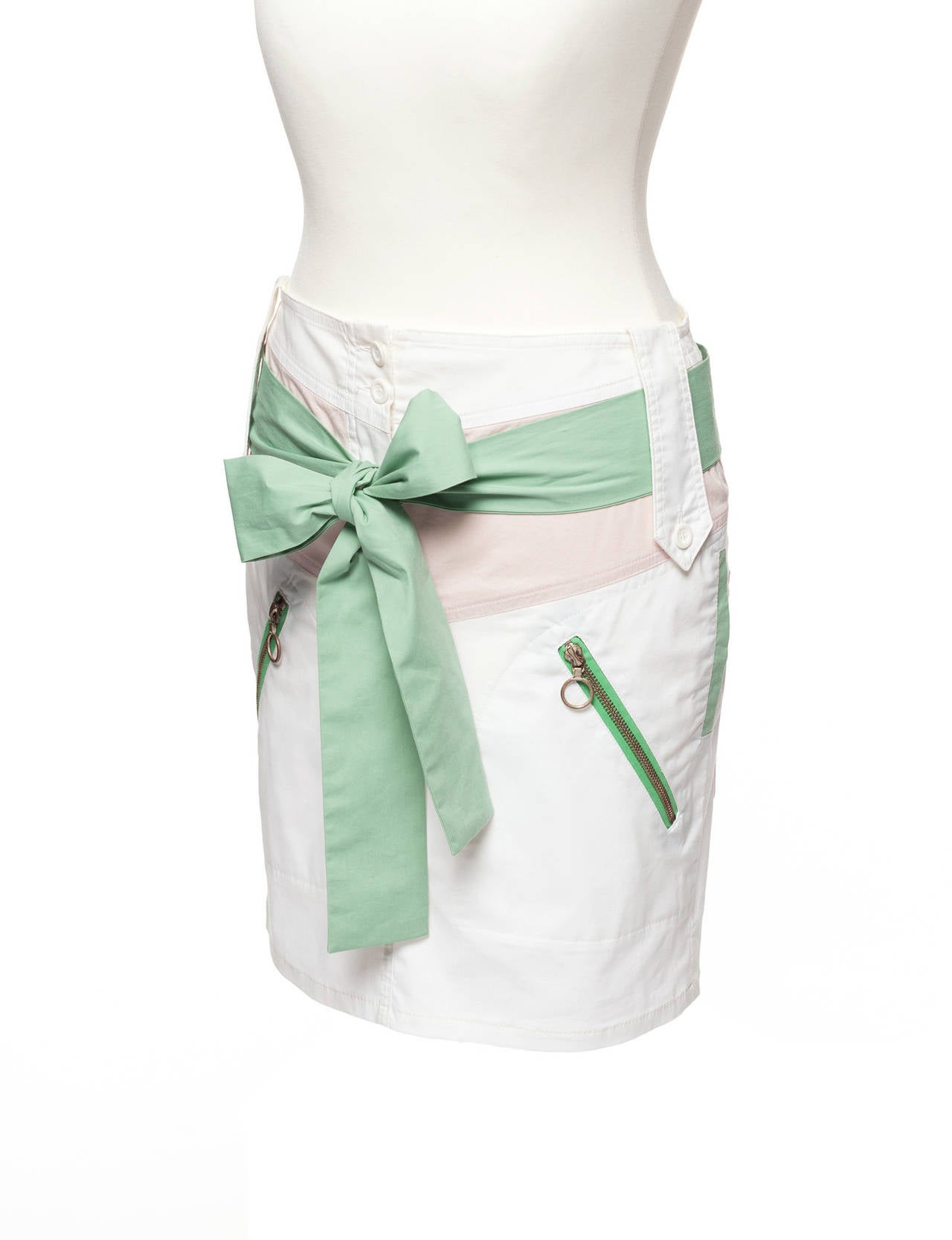 Skirt has multiple color blocked details in pastel tones (mint and rose), long waist sash, side pocket zippers, paperbag style waist. This is a runway sample. US 8, EU 36