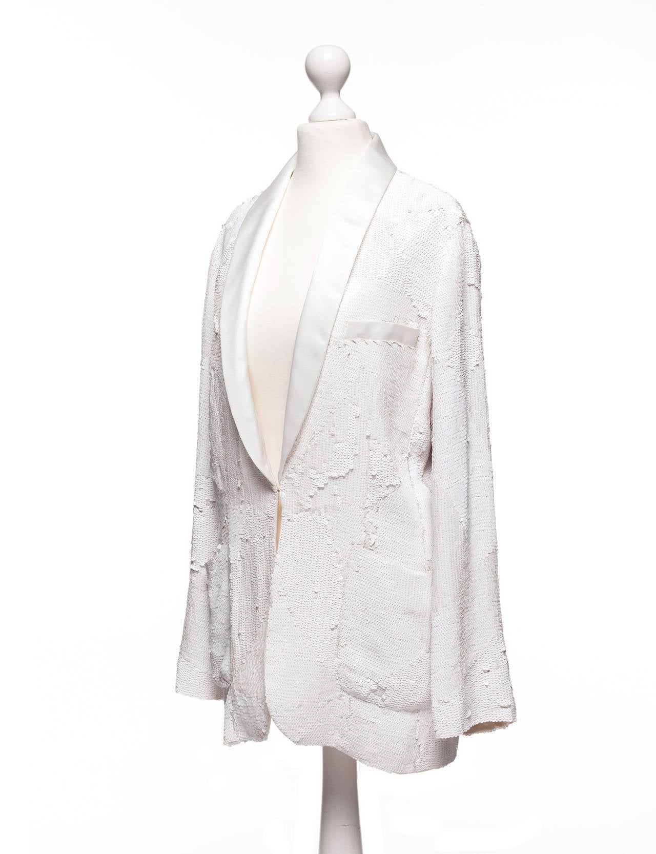 Chloe by Stella McCartney sequin ecru Blazer. Blazer is smoking style with sequin going in different directions to form abstract pattern, satin lapels, soft draping, hook and eye closure. This is a runway sample.